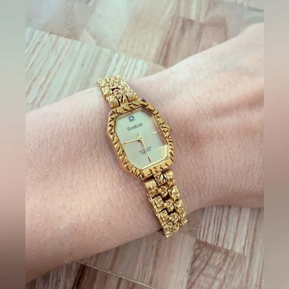Armitron ladies octagonal gold tone diamond dress watch NEW BATTERY